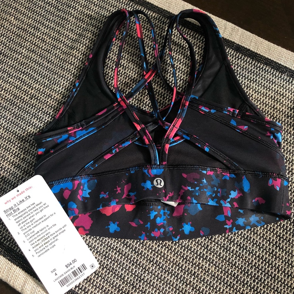Super cute. Brand New, never worn, with tags LuLuLemon sports bra. Size 4.